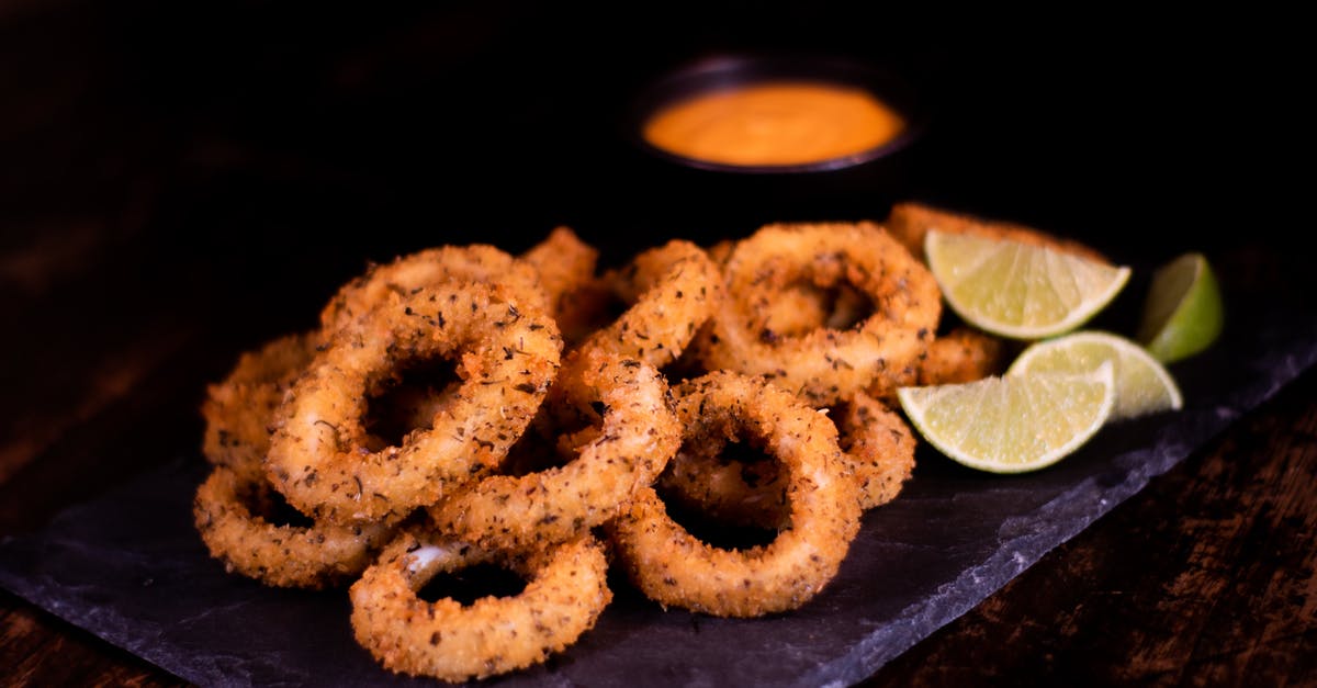 Can you get food poisoning from calamari rings? - Fried onion rings and slices of lime Can you get food poisoning from calamari rings? - Fried onion rings and slices of lime