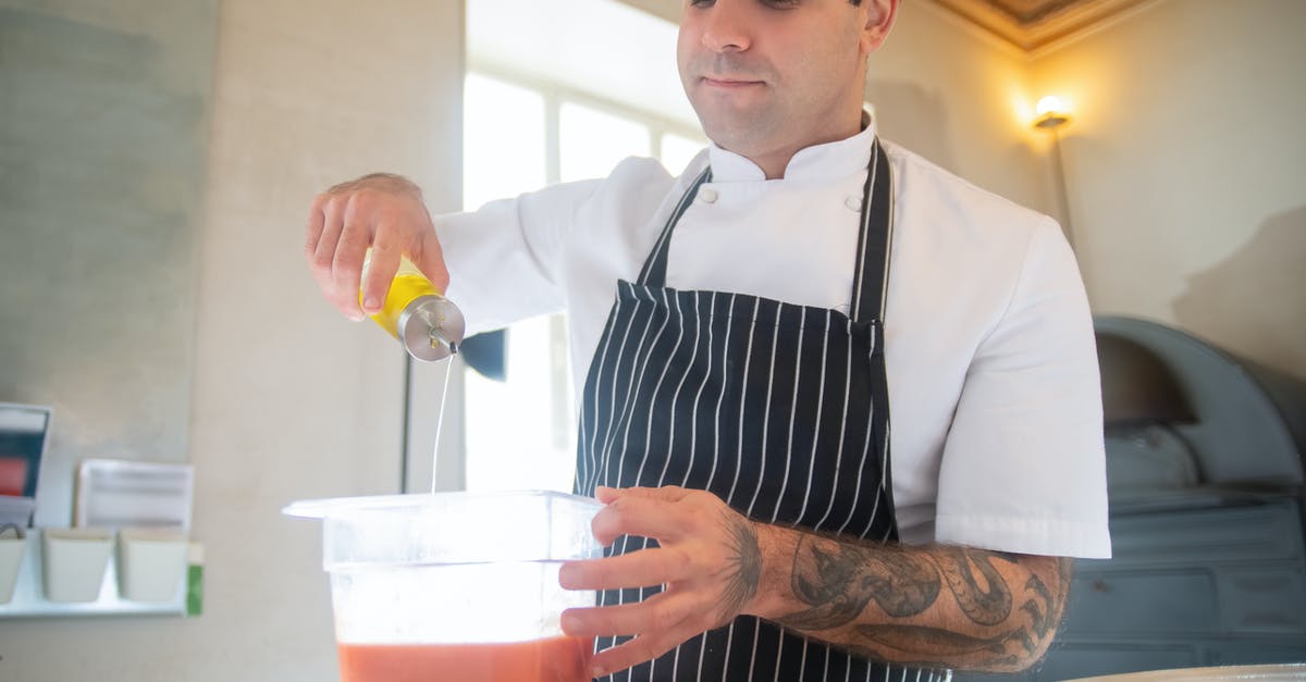 Can you interchange oil and butter in emulsified sauces? - Man in Striped Apron Pouring Oil into Bowl Can you interchange oil and butter in emulsified sauces? - Man in Striped Apron Pouring Oil into Bowl