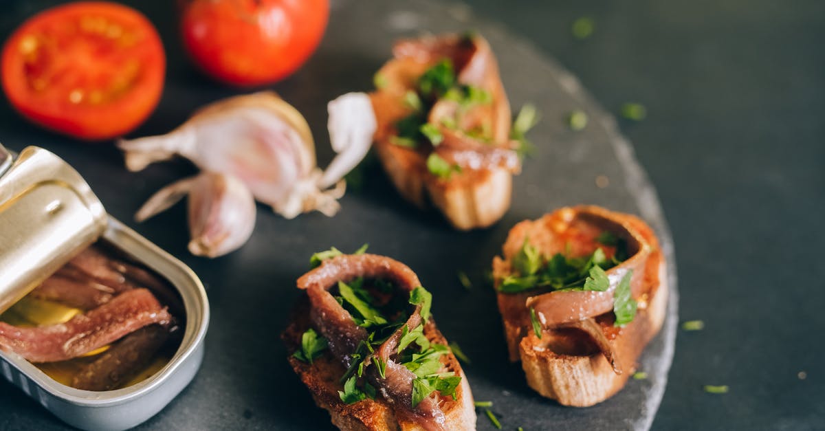 Can you make bread with the yeast in beer? - Photo of a Can of Anchovies Near Bread Can you make bread with the yeast in beer? - Photo of a Can of Anchovies Near Bread