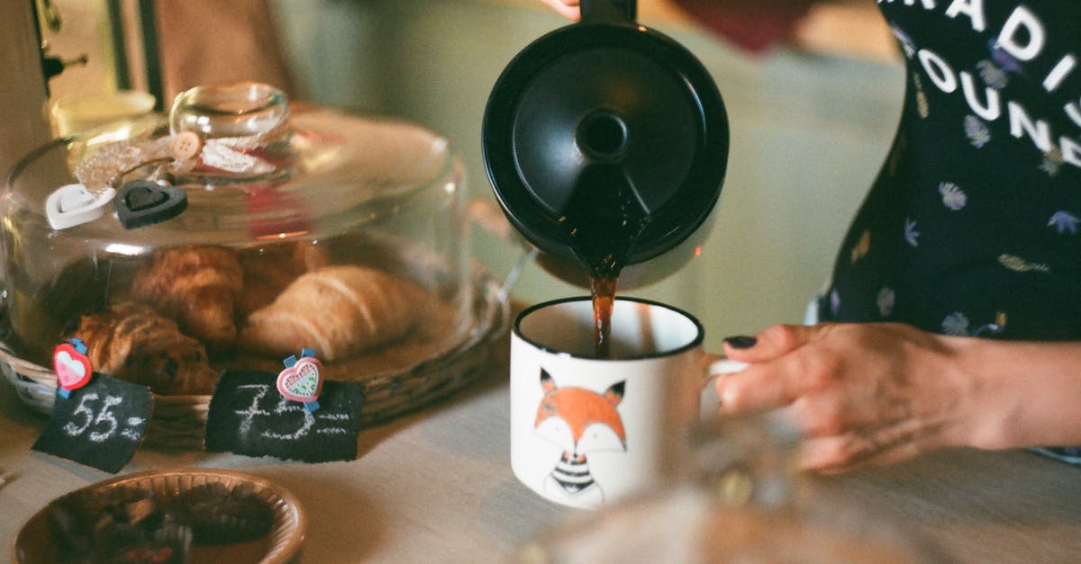 Can you make croissants with compound butter? - Person Pouring Coffee on White Ceramic Mug Can you make croissants with compound butter? - Person Pouring Coffee on White Ceramic Mug
