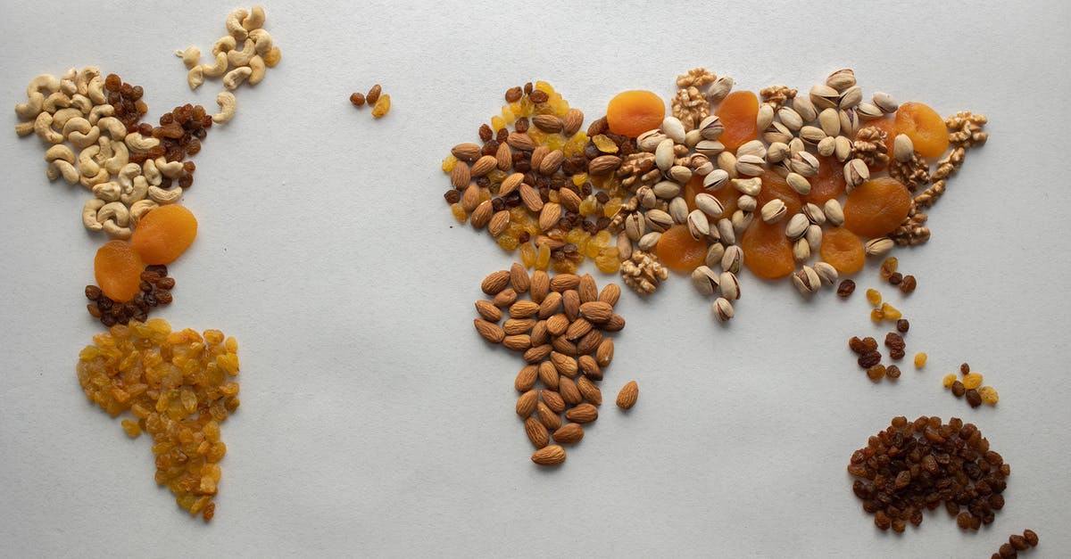 Can you make nut butters without dehydrating nuts? - Top view of creative world continents made of various nuts and assorted dried fruits on white background in light room Can you make nut butters without dehydrating nuts? - Top view of creative world continents made of various nuts and assorted dried fruits on white background in light room