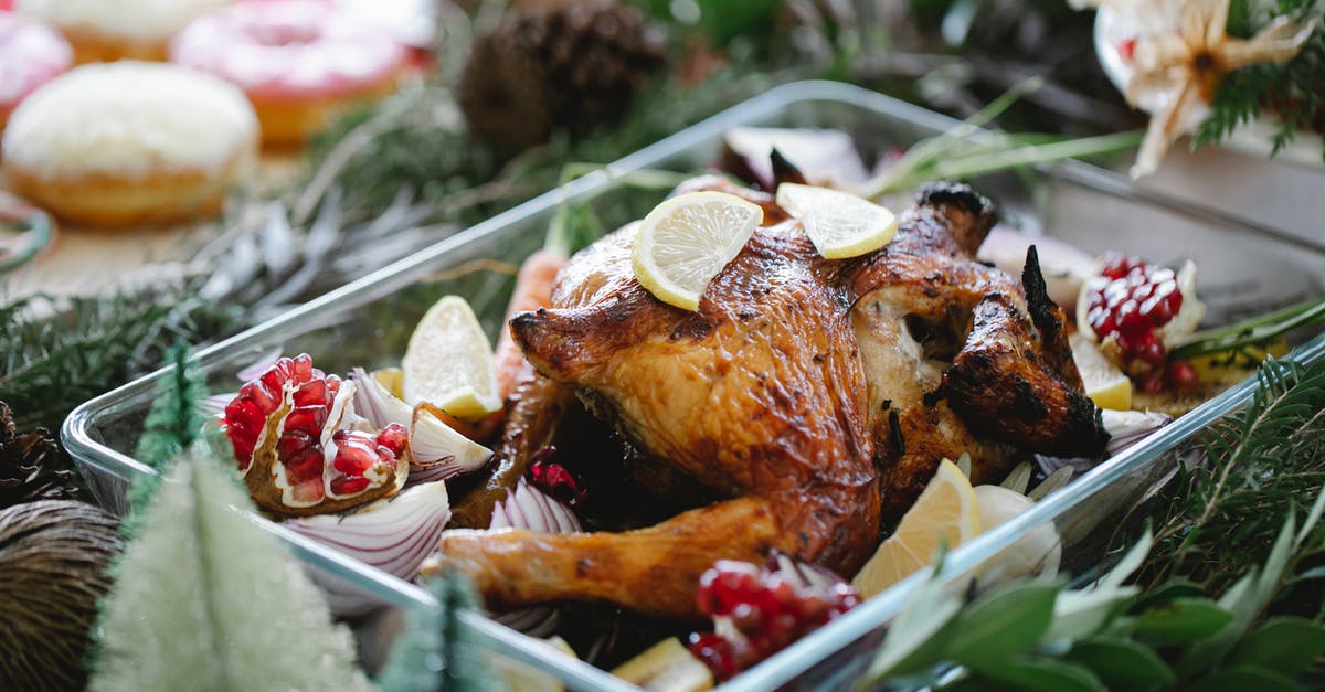 Can you make pan gravy if the turkey was brined? - Turkey in baking dish with lemon and pomegranate served on table with Christmas fir decorations Can you make pan gravy if the turkey was brined? - Turkey in baking dish with lemon and pomegranate served on table with Christmas fir decorations