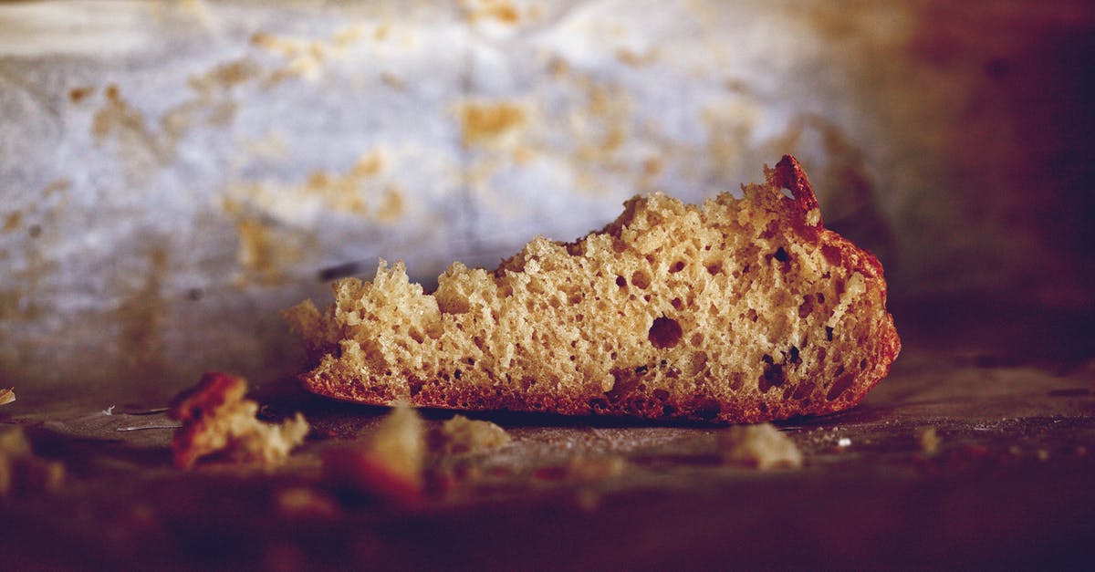Can you re-use parchment paper when baking batches of cookies? - Brown Bread on Brown Wooden Table Can you re-use parchment paper when baking batches of cookies? - Brown Bread on Brown Wooden Table