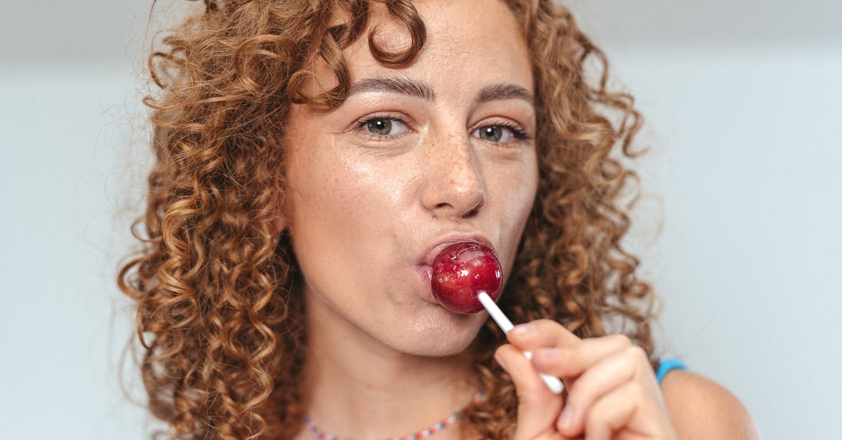 Candi sugar problems around 130°C — what happened? - Woman in Blue Tank Top With Red Lipstick