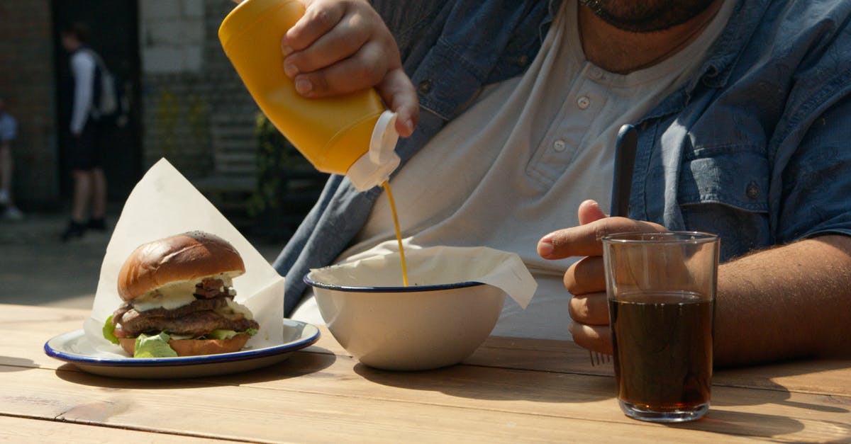 canning a mustard vinegar sauce - Person Putting Mustard Sauce in Ceramic Bowl canning a mustard vinegar sauce - Person Putting Mustard Sauce in Ceramic Bowl
