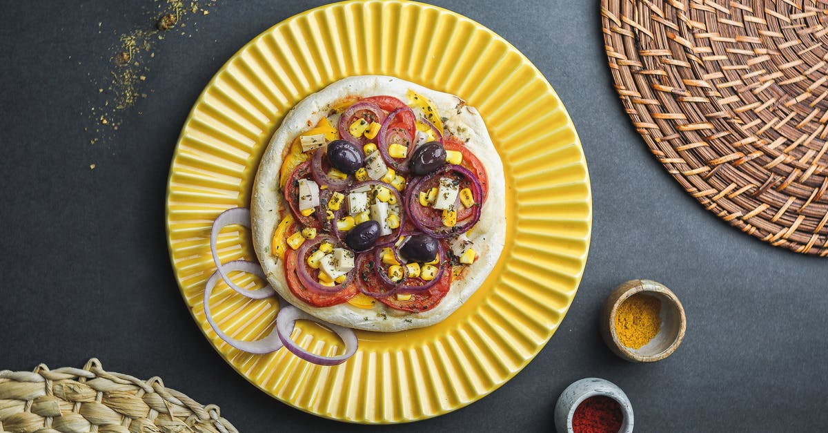 Canning tomato sauce problem, jar broken in boiling method - Flat lay of pizza made of thick dough with vegetables and cheese served in plate near jars with condiment and wicker dishes Canning tomato sauce problem, jar broken in boiling method - Flat lay of pizza made of thick dough with vegetables and cheese served in plate near jars with condiment and wicker dishes