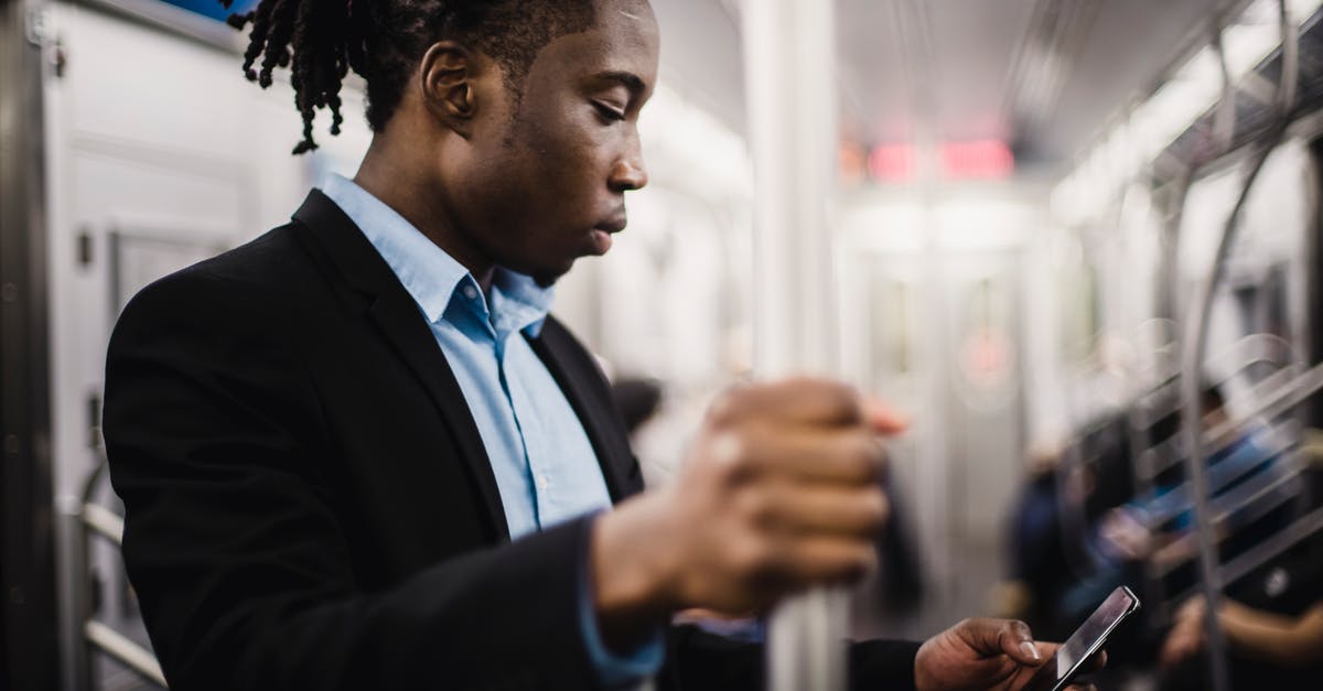 Can/should I use rapid rise yeast for longer proofing? - Young African American man using smartphone on train Can/should I use rapid rise yeast for longer proofing? - Young African American man using smartphone on train
