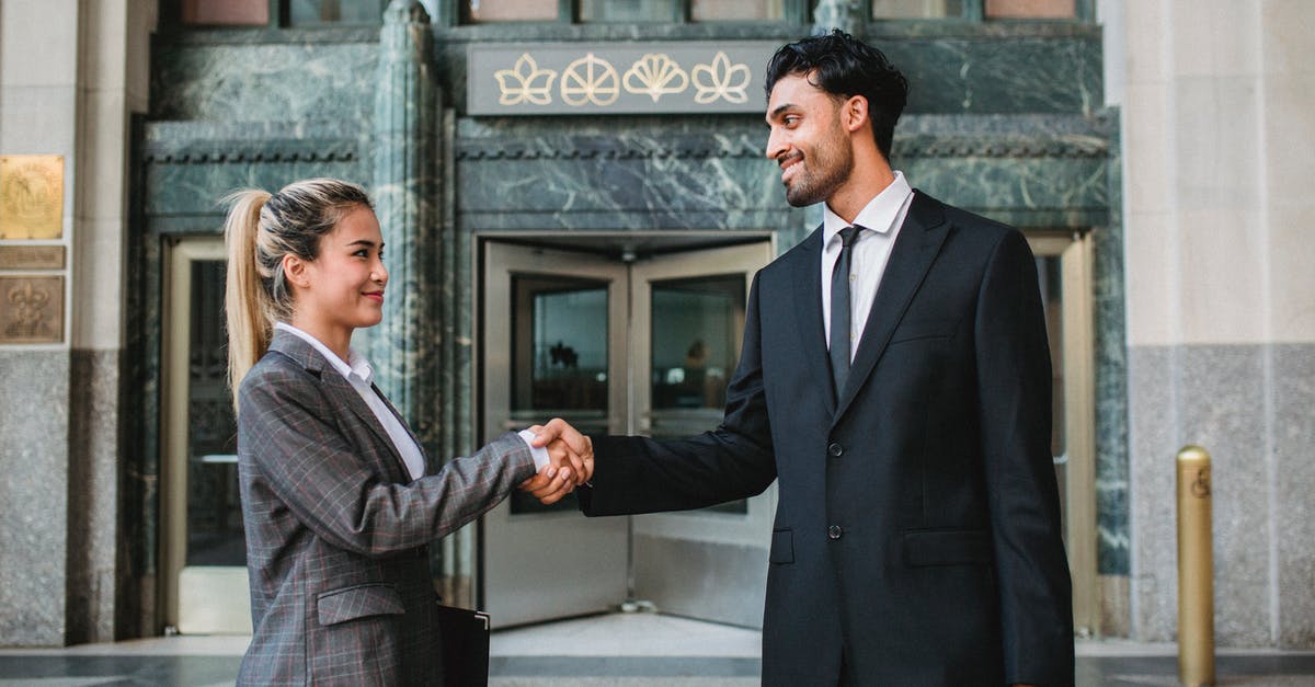 Carbonation diffuser versus shaking - Man and Woman Shaking Hands Carbonation diffuser versus shaking - Man and Woman Shaking Hands