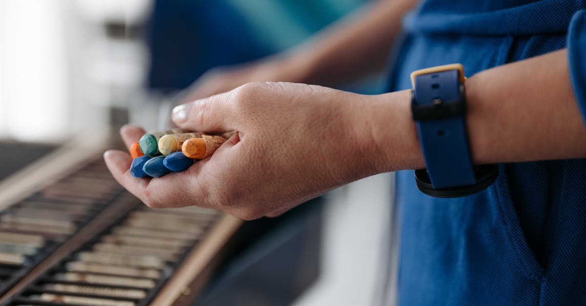 Casing of wieners - A Person Holding Coloring Chalks Casing of wieners - A Person Holding Coloring Chalks