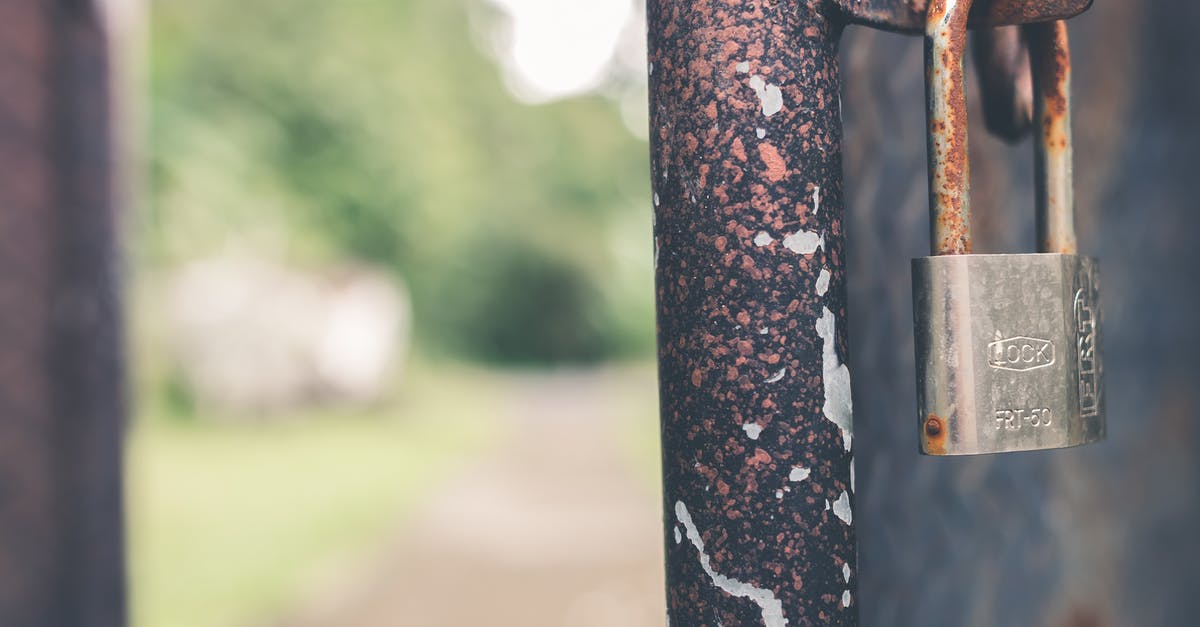 cast iron pan rusting on bottom surface - Rusted Grey Padlock in Selective-focus Photography cast iron pan rusting on bottom surface - Rusted Grey Padlock in Selective-focus Photography