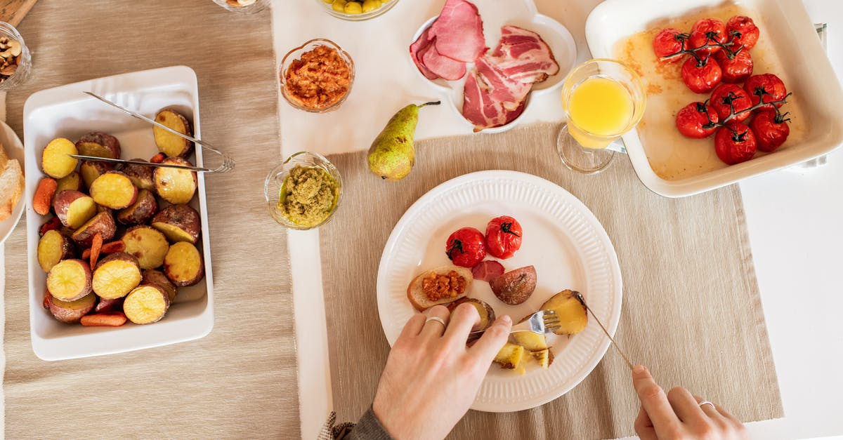 Cheese like slime on potato, but no pinkness - Photo Of Tray With Foods Cheese like slime on potato, but no pinkness - Photo Of Tray With Foods
