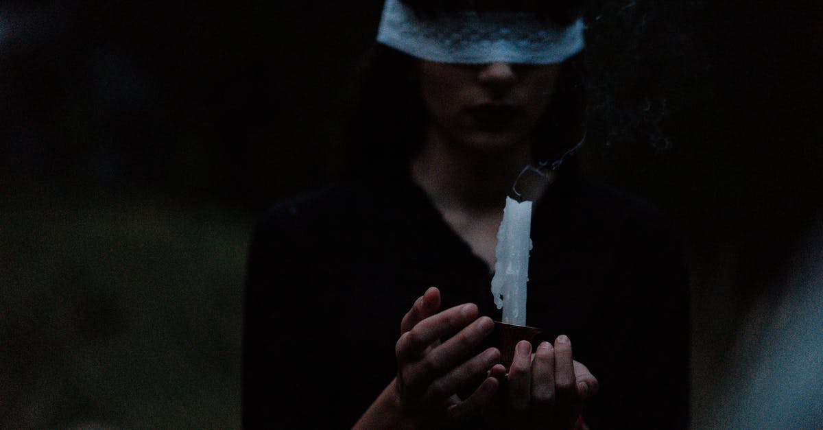 Cheesemaking produces strange bicolored whey - Blindfolded Woman With a Candle Cheesemaking produces strange bicolored whey - Blindfolded Woman With a Candle