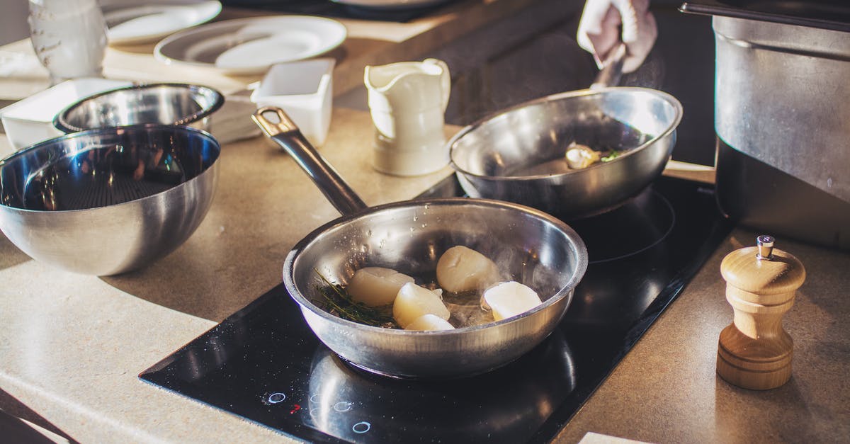 Chef at restaurant seemed to be using really flimsy pans - Photo Of Man Holding Pan Chef at restaurant seemed to be using really flimsy pans - Photo Of Man Holding Pan