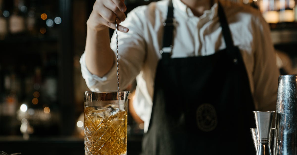 Chemical process behind hardening ice cream - Man in White Shirt Holding Clear Drinking Glass Chemical process behind hardening ice cream - Man in White Shirt Holding Clear Drinking Glass