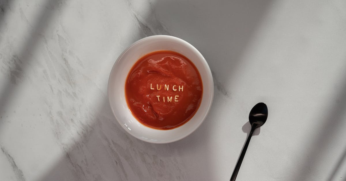 Chili cooking time - White Ceramic Mug With Red Liquid Inside Chili cooking time - White Ceramic Mug With Red Liquid Inside