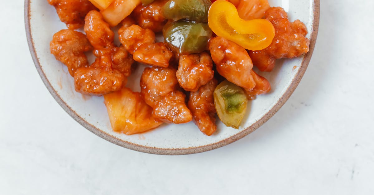 Chinese chicken balls - should the chicken be precooked? - Close-up Shot of a Food on White Ceramic Plate