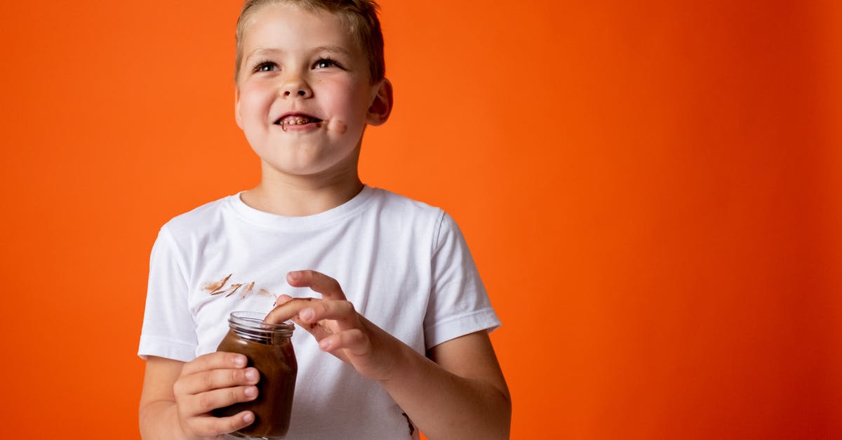 Chocolate spread preservation - Boy in White Crew Neck T-shirt Holding Chocolate Jar Chocolate spread preservation - Boy in White Crew Neck T-shirt Holding Chocolate Jar