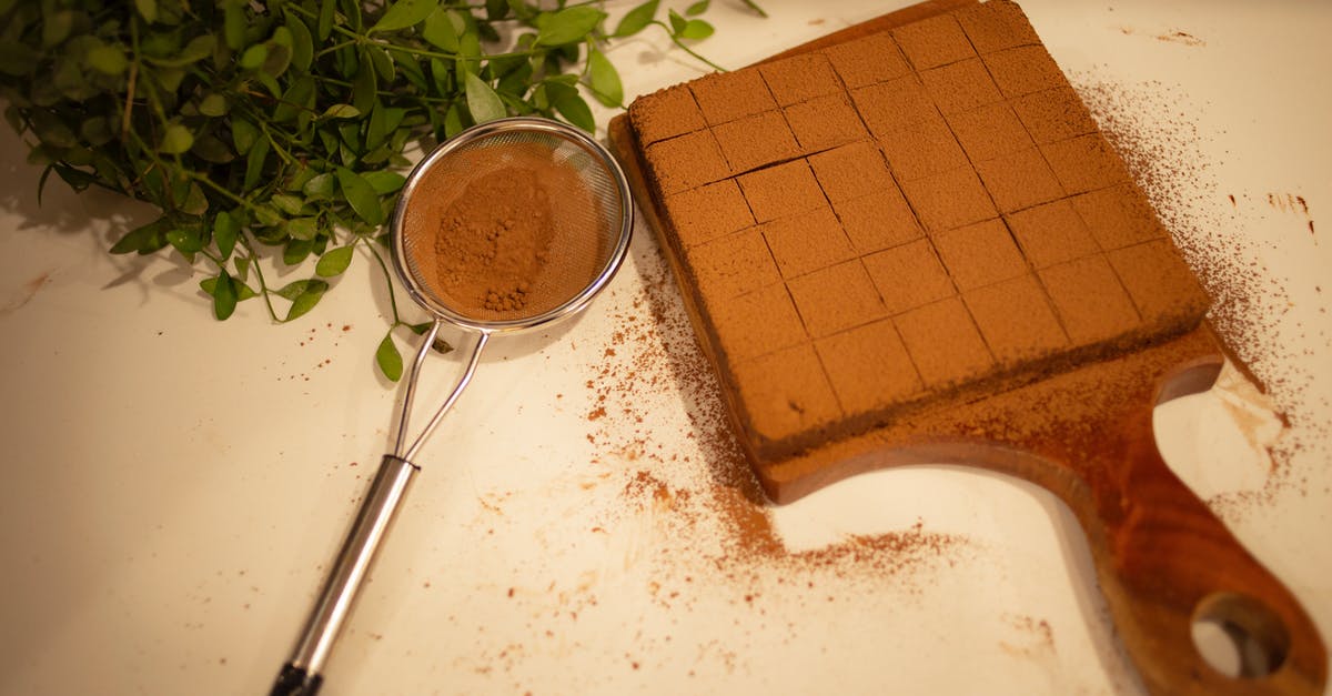 chocolate substitutions in baking brownies from scratch - Chocolate Brownie on Wooden Board and Sieve with Cocoa Powder chocolate substitutions in baking brownies from scratch - Chocolate Brownie on Wooden Board and Sieve with Cocoa Powder