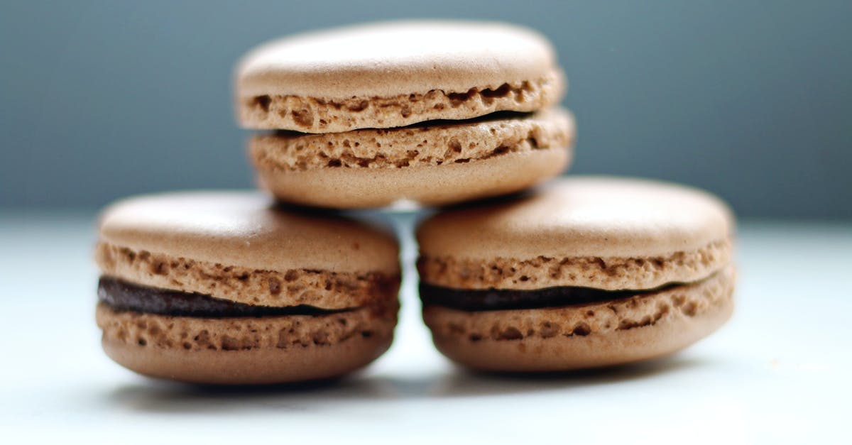 Chocolate won’t harden up on my cookies - Selective Focus Photo of Three Macaroons Chocolate won’t harden up on my cookies - Selective Focus Photo of Three Macaroons