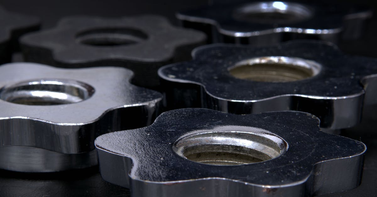 Cleaning silver with aluminum - Gray Steel Floral Shaped Component