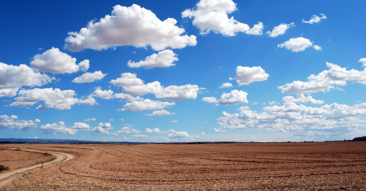 Cloudy white vinegar - Brown Field and Blue Sky Cloudy white vinegar - Brown Field and Blue Sky