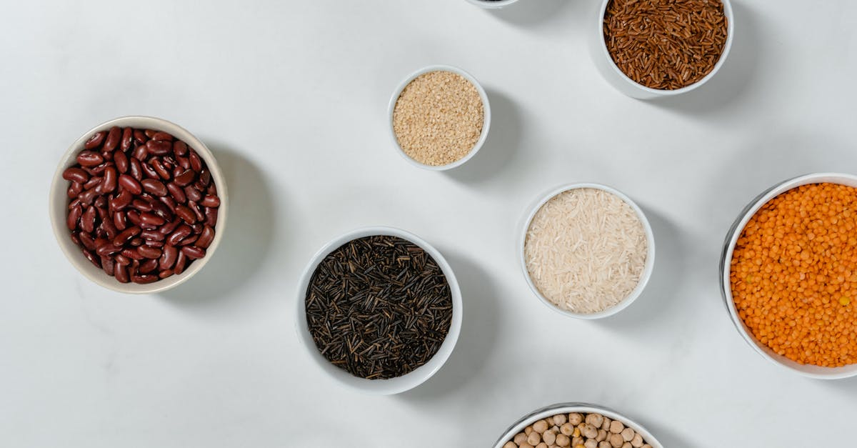 Cloves vs. Nutmeg in Chili Recipe - Brown and White Round Containers