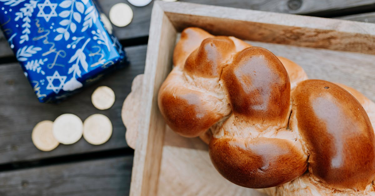 Coins in bread? - Top View Photo Of Bread Beside Gift Coins in bread? - Top View Photo Of Bread Beside Gift