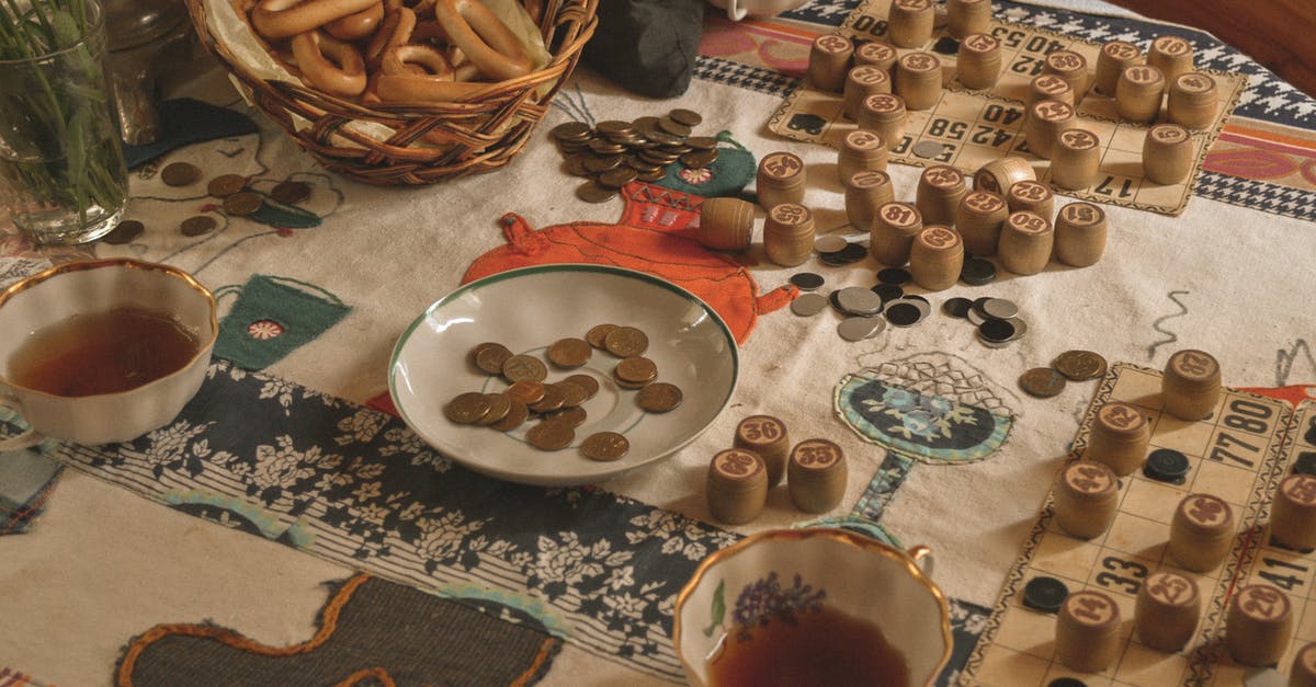 Coins in bread? - Saucer with Coins and Bingo Wooden Barrels Bingo Coins in bread? - Saucer with Coins and Bingo Wooden Barrels Bingo