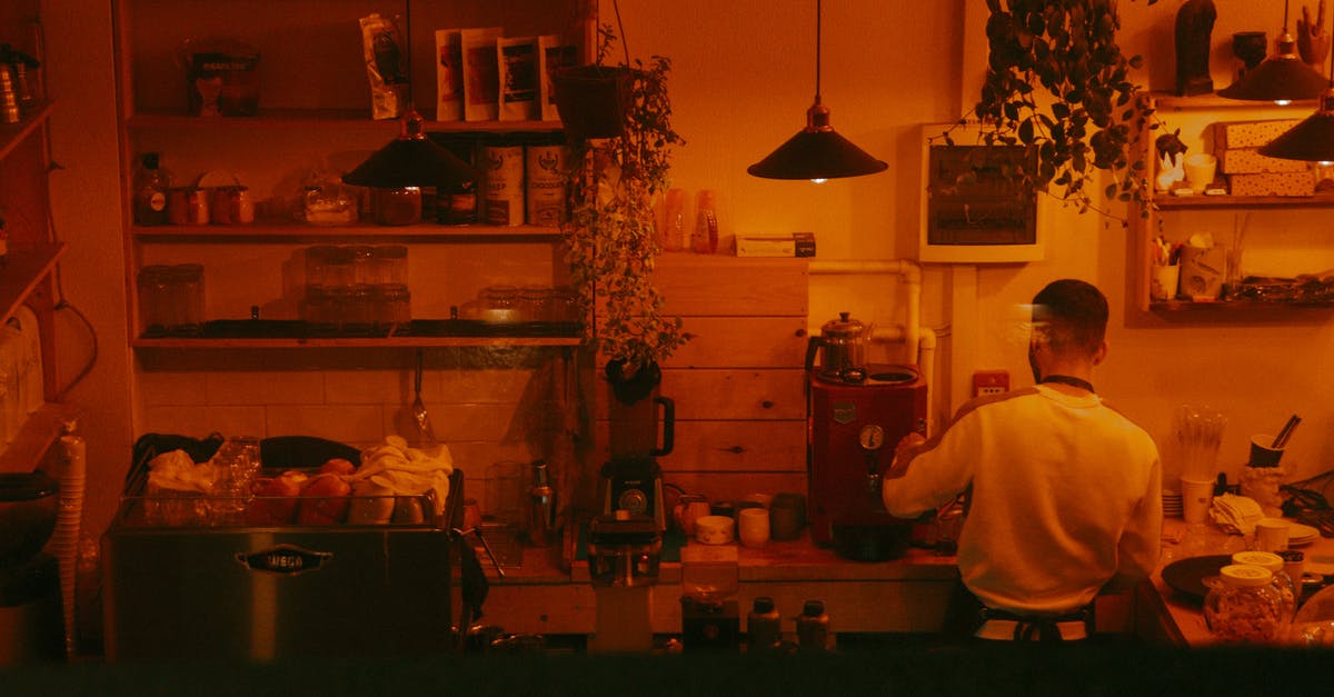 Commercial fridge for thawing - Man in White Shirt Standing in Kitchen Commercial fridge for thawing - Man in White Shirt Standing in Kitchen