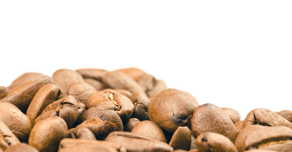 Conversion rate in volume of freshly picked beans as opposed to dried beans - Selective Focus Photography of Coffee Beans Conversion rate in volume of freshly picked beans as opposed to dried beans - Selective Focus Photography of Coffee Beans