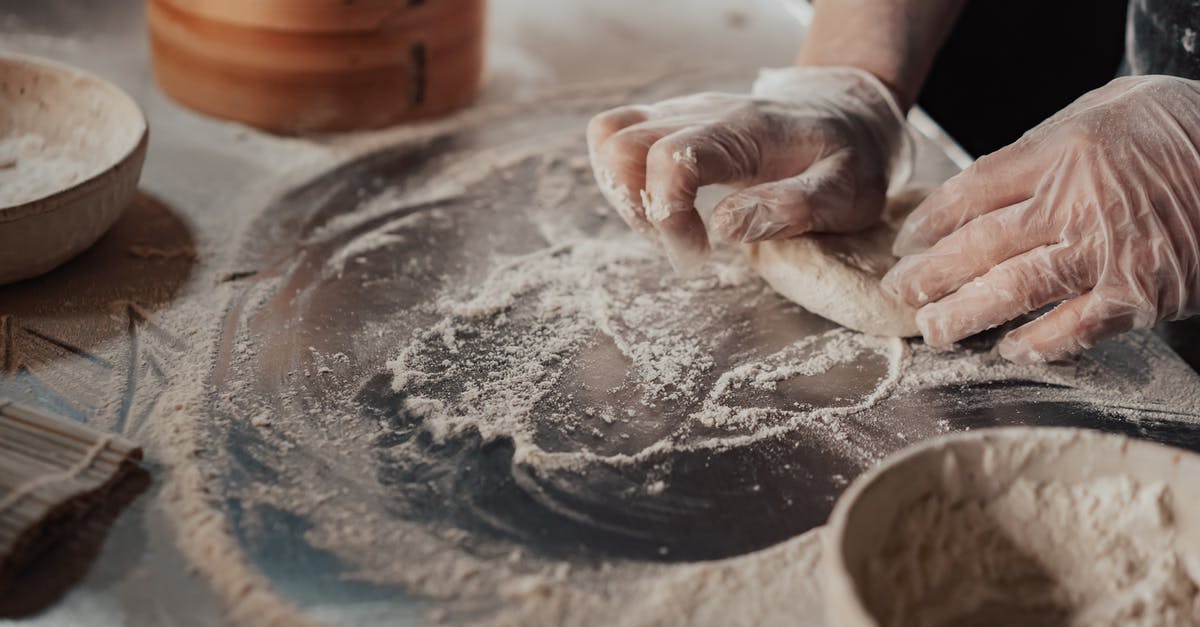 Converting kneading times from machine kneading to hand kneading - Person Kneading a Dough Converting kneading times from machine kneading to hand kneading - Person Kneading a Dough