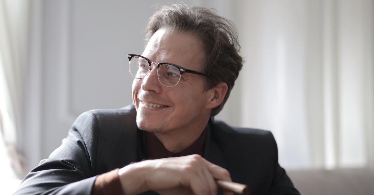 Converting upright charcoal smoker to electric - Photo of Smiling Man in Black Suit and Black Framed Eyeglasses Sitting on White Couch Smoking a Cigar Converting upright charcoal smoker to electric - Photo of Smiling Man in Black Suit and Black Framed Eyeglasses Sitting on White Couch Smoking a Cigar