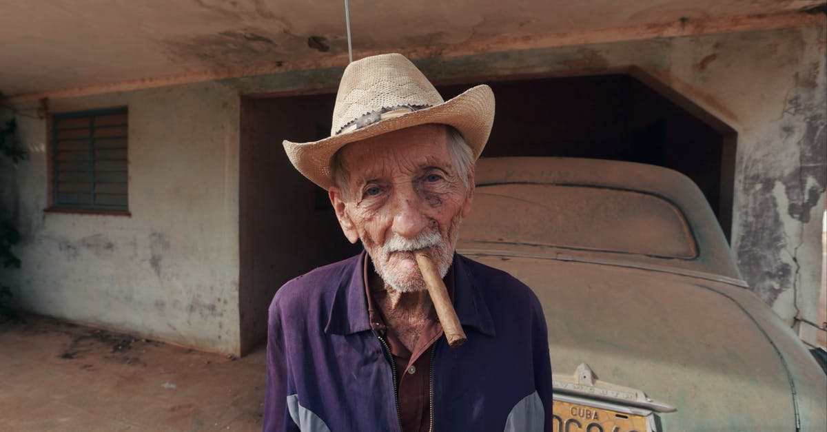 Converting upright charcoal smoker to electric - Man in Blue Dress Shirt Wearing Brown Cowboy Hat Converting upright charcoal smoker to electric - Man in Blue Dress Shirt Wearing Brown Cowboy Hat
