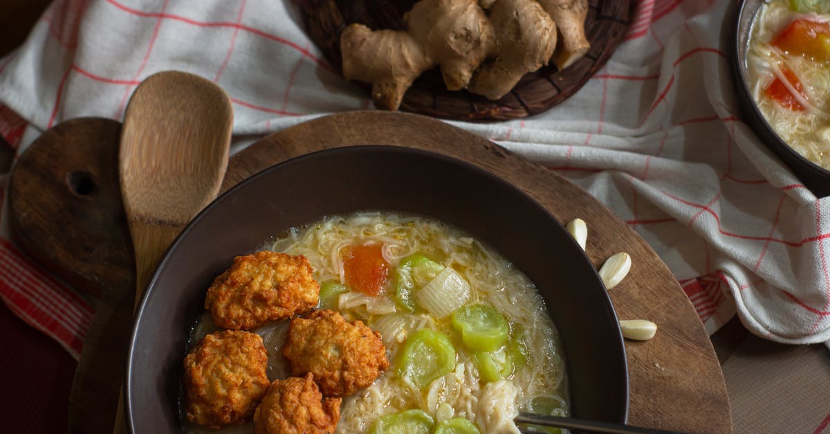 Cooking Chicken meat with bones in soup is better than cooking Chicken bones in soup? [duplicate] - Cooked Food on Black Bowl