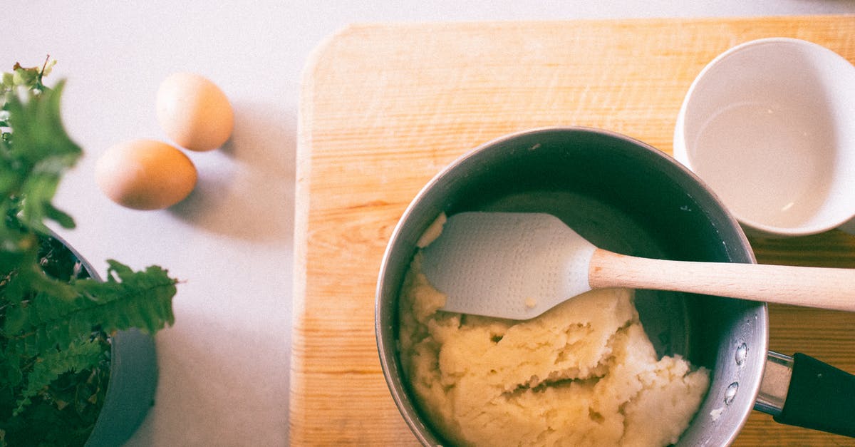 Cooking eggs too soon for Keto dough - Pot With Spatula on Brown Chopping Board Cooking eggs too soon for Keto dough - Pot With Spatula on Brown Chopping Board