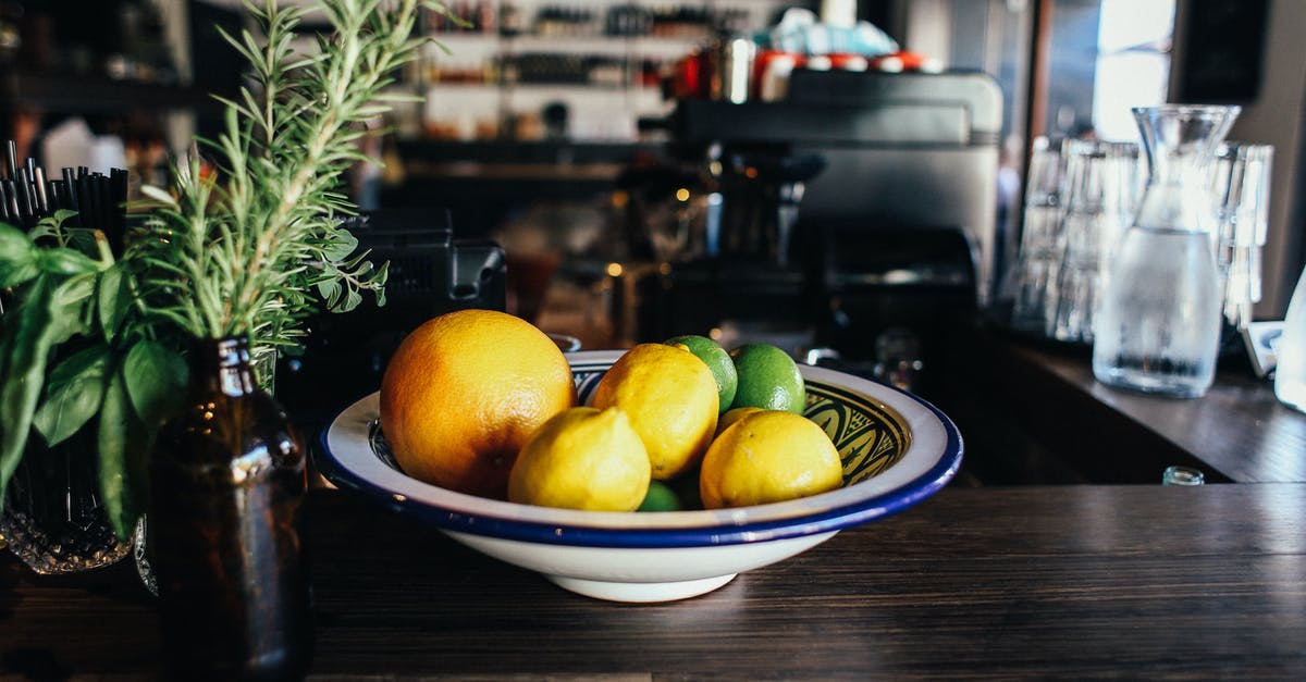 Cooking lemon juice into stew - Yellow Citrus Fruits on White and Blue Ceramic Plate Cooking lemon juice into stew - Yellow Citrus Fruits on White and Blue Ceramic Plate