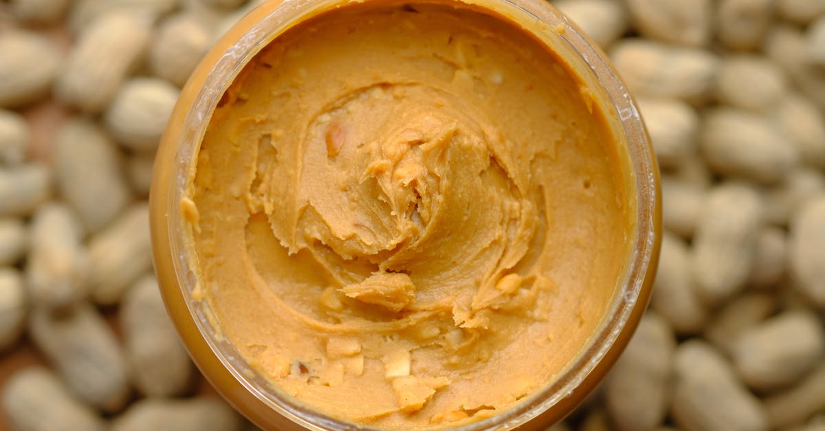 Cooking peanut butter cookies, is there any adjustment using crunchy vs. creamy? - Brown Powder in Brown Round Container