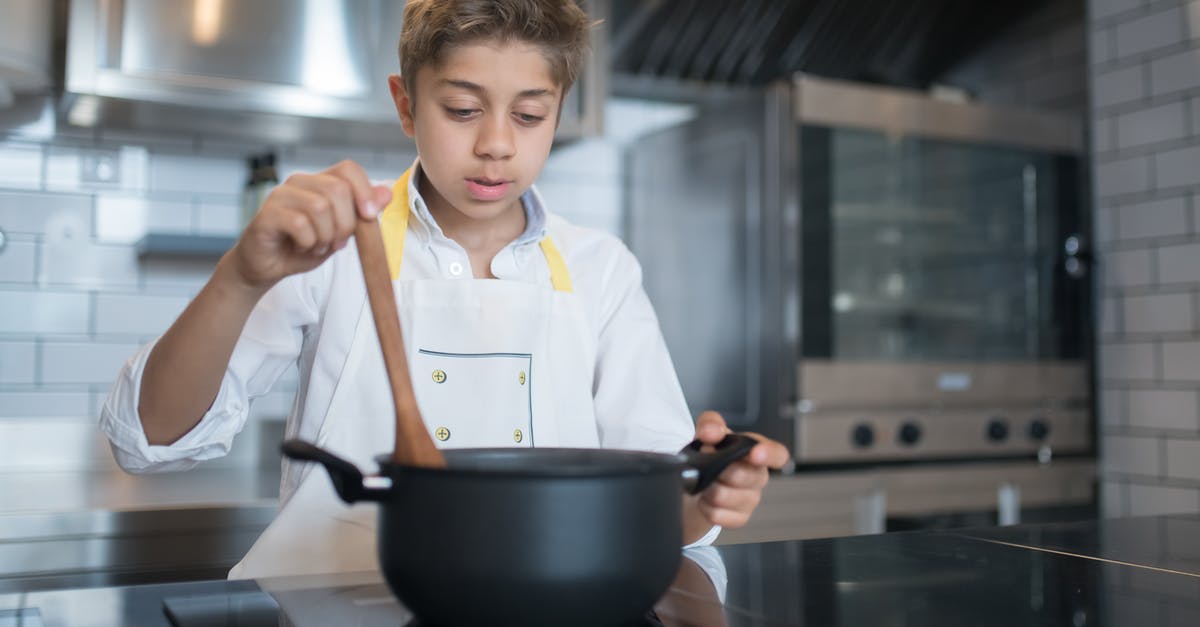 Cooking polenta: is stirring for 30 minutes really necessary? - A Young Boy Stirring a Pot Cooking polenta: is stirring for 30 minutes really necessary? - A Young Boy Stirring a Pot
