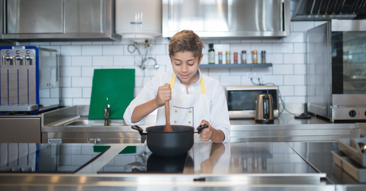 Cooking polenta: is stirring for 30 minutes really necessary? - A Young Boy Stirring a Pot Cooking polenta: is stirring for 30 minutes really necessary? - A Young Boy Stirring a Pot