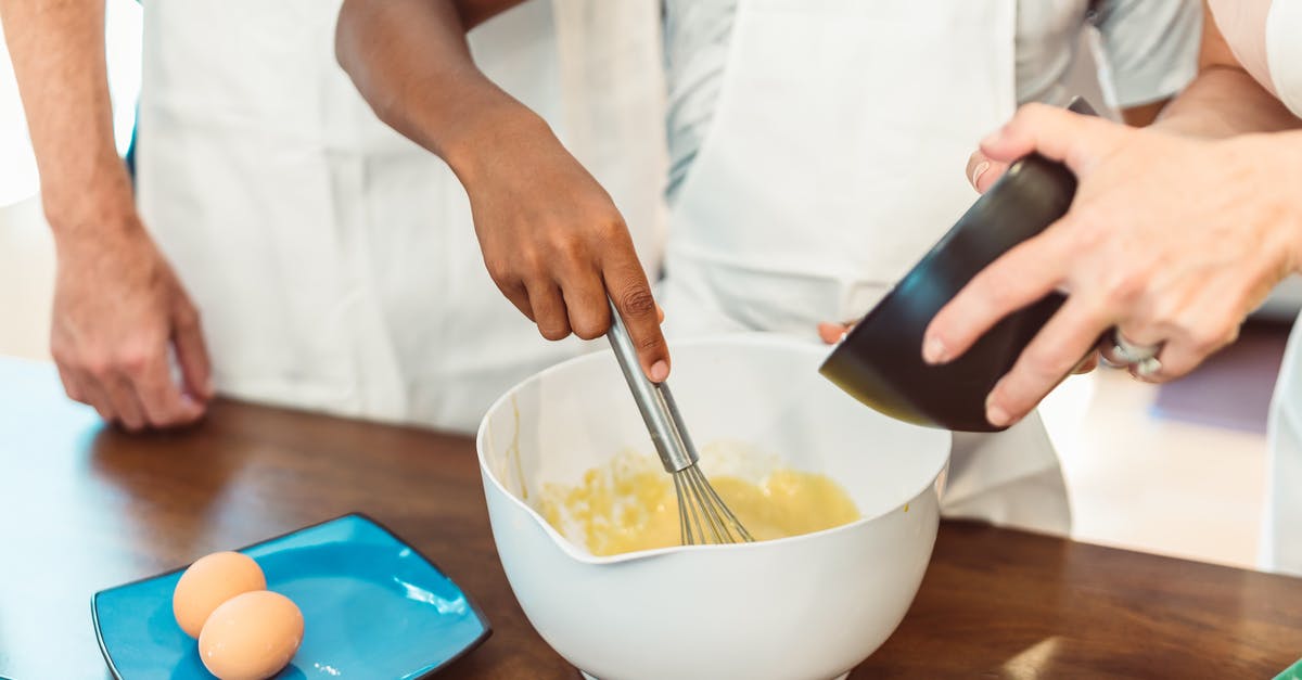 Cooking polenta: is stirring for 30 minutes really necessary? - Person whisking Mixture in a Bowl Cooking polenta: is stirring for 30 minutes really necessary? - Person whisking Mixture in a Bowl