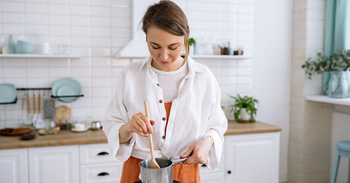 Cooking polenta: is stirring for 30 minutes really necessary? - A Woman in White Long Sleeve Shirt Cooking with a Stainless Pot Cooking polenta: is stirring for 30 minutes really necessary? - A Woman in White Long Sleeve Shirt Cooking with a Stainless Pot
