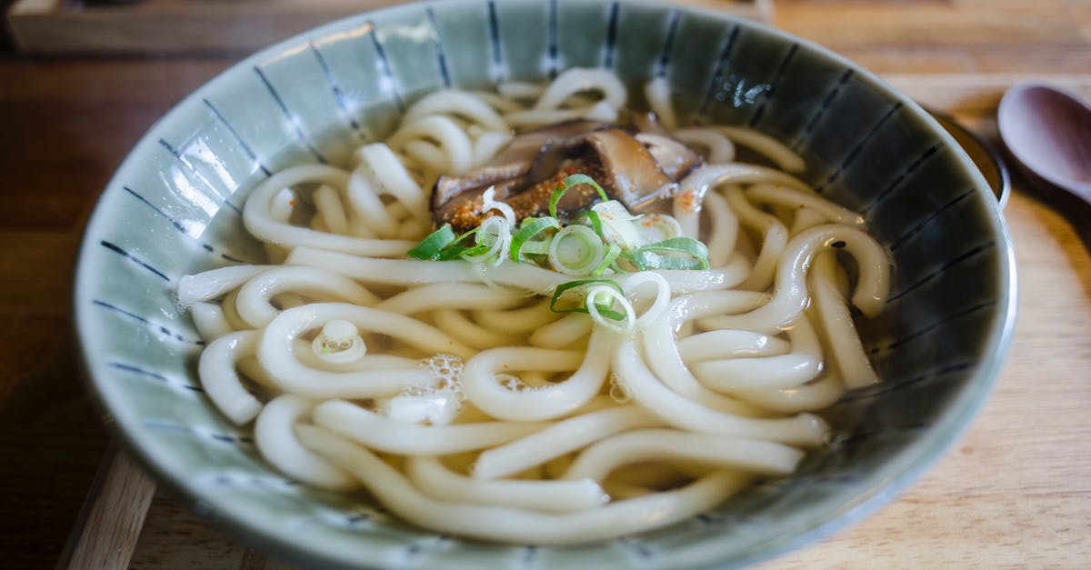 Cooking Ramen noodles in broth or not? - Broth with Pasta in Ceramic Bowl Cooking Ramen noodles in broth or not? - Broth with Pasta in Ceramic Bowl