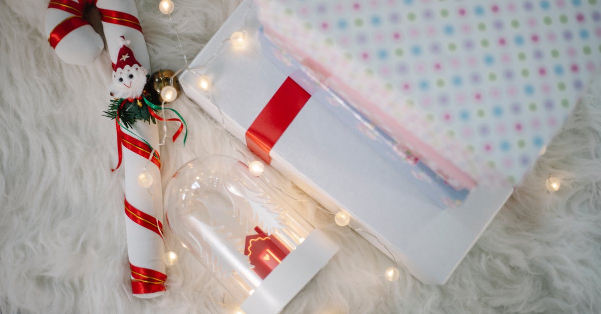 Cooking Small White Navy's giving me issues [duplicate] - Top view of colorful Christmas present boxes and decorations placed on soft white carpet