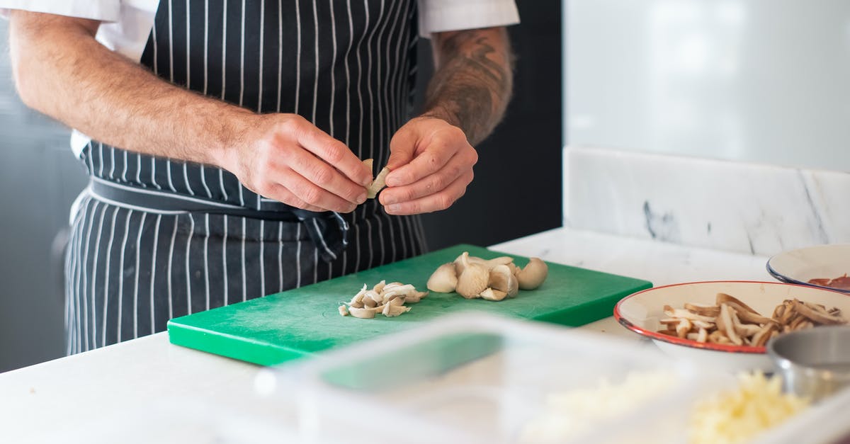 Cooking with a cut or burn on my hands - Man in Striped Apron Chopping Mushrooms on Green Chopping Board Cooking with a cut or burn on my hands - Man in Striped Apron Chopping Mushrooms on Green Chopping Board