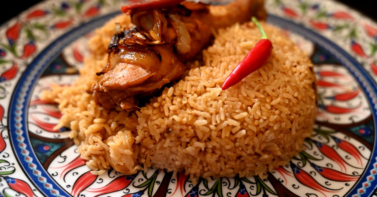Cookware and methods for large quantities of rice - Fried Rice on White and Red Plate Cookware and methods for large quantities of rice - Fried Rice on White and Red Plate