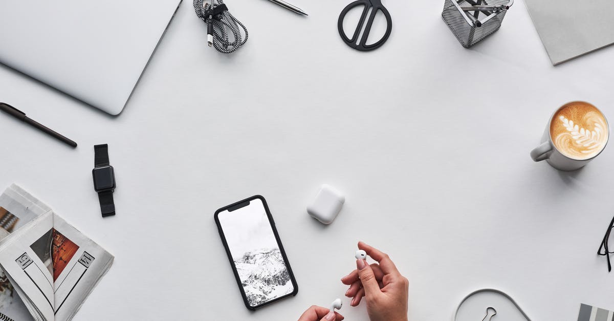 Cooling coffee rapidly without dilution - Top View Photo of Person Holding Earphones