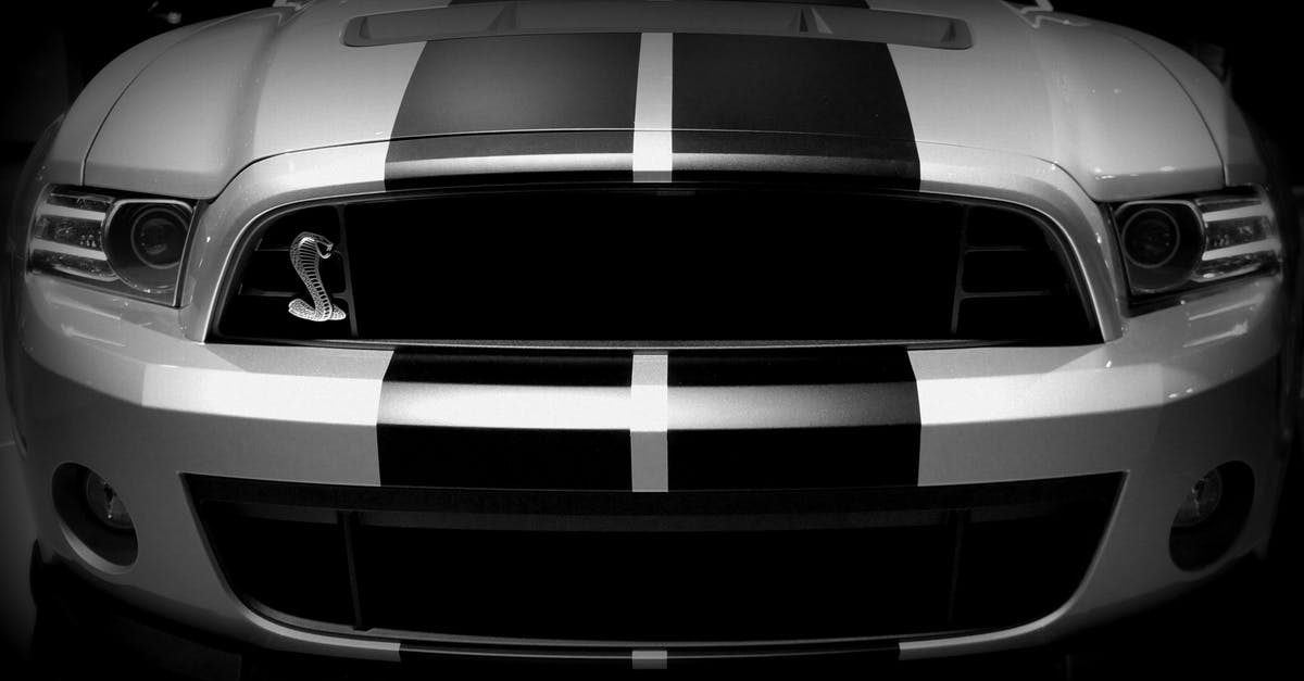 Cooling off a kettle-style grill - Grayscale Photo of Dodge Viper Cooling off a kettle-style grill - Grayscale Photo of Dodge Viper