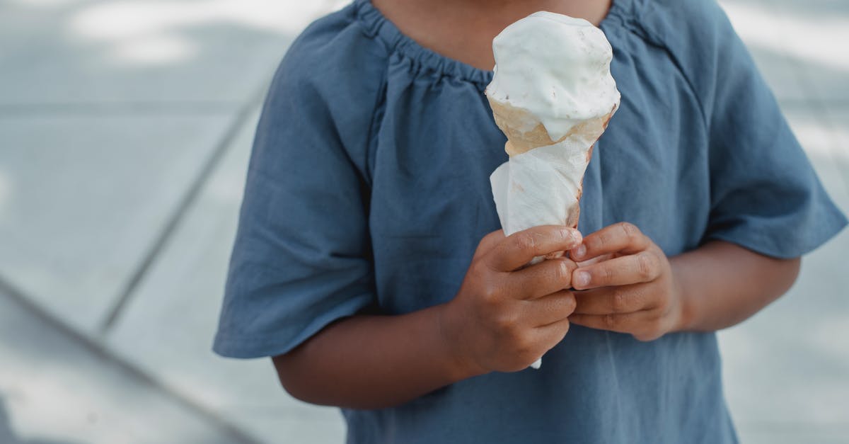 cooling pasturized milk - Child with melting ice cream cone