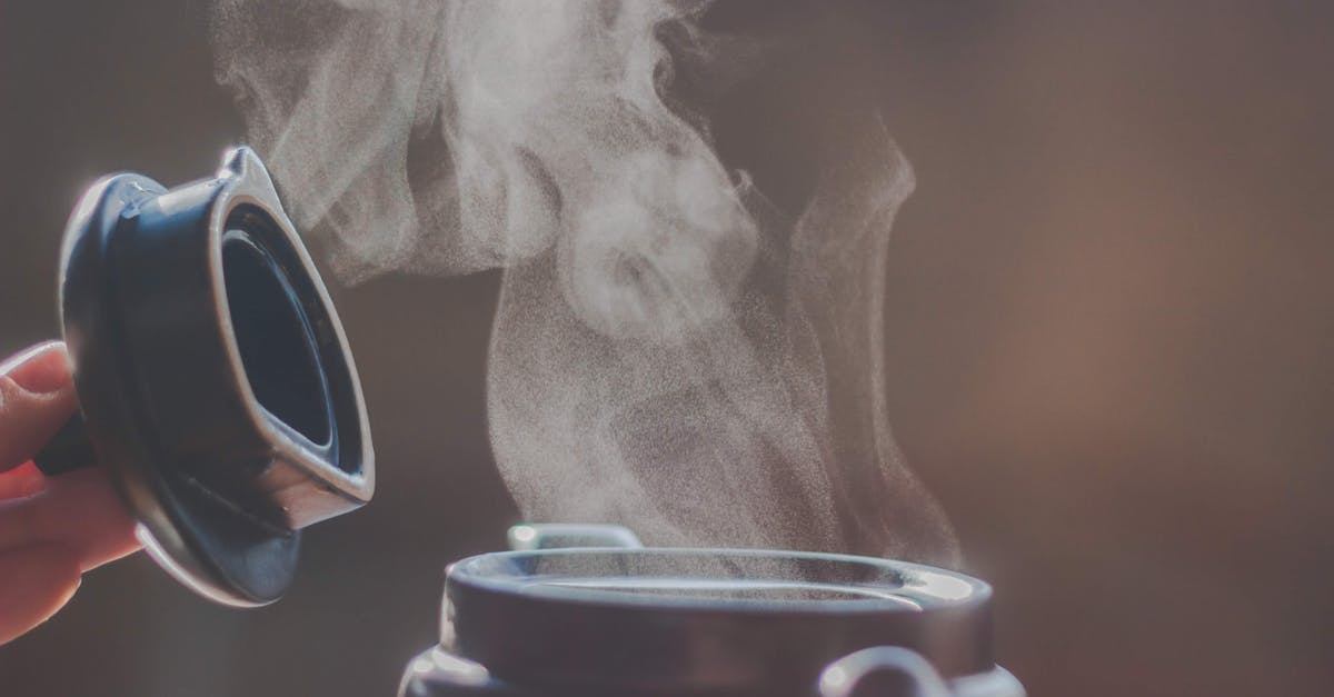 Corelle Visions Covered Versa Pot 1.25 L - Selective Focus Photography Of Jar Releasing Smoke Corelle Visions Covered Versa Pot 1.25 L - Selective Focus Photography Of Jar Releasing Smoke