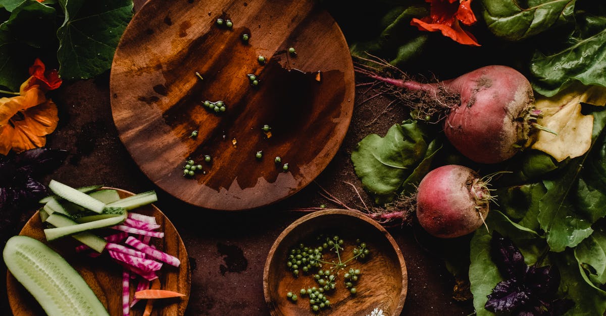 Coriander Seeds - Sliced Fruits and Vegetables on a Wooden Plate Coriander Seeds - Sliced Fruits and Vegetables on a Wooden Plate